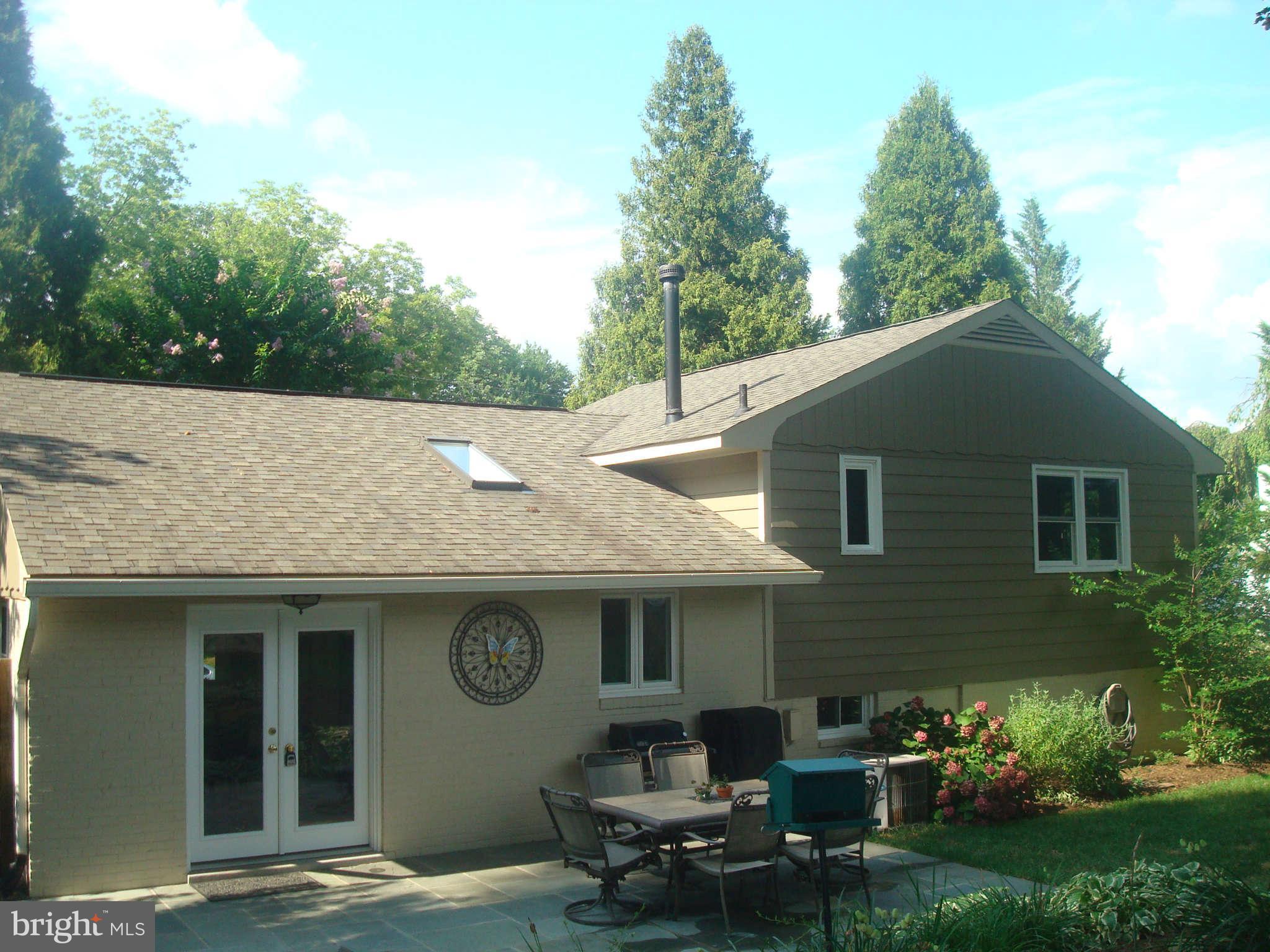 7413 Farnum Street Springfield, VA 22151 - Photo 13 of 17 a front view of a house with garden