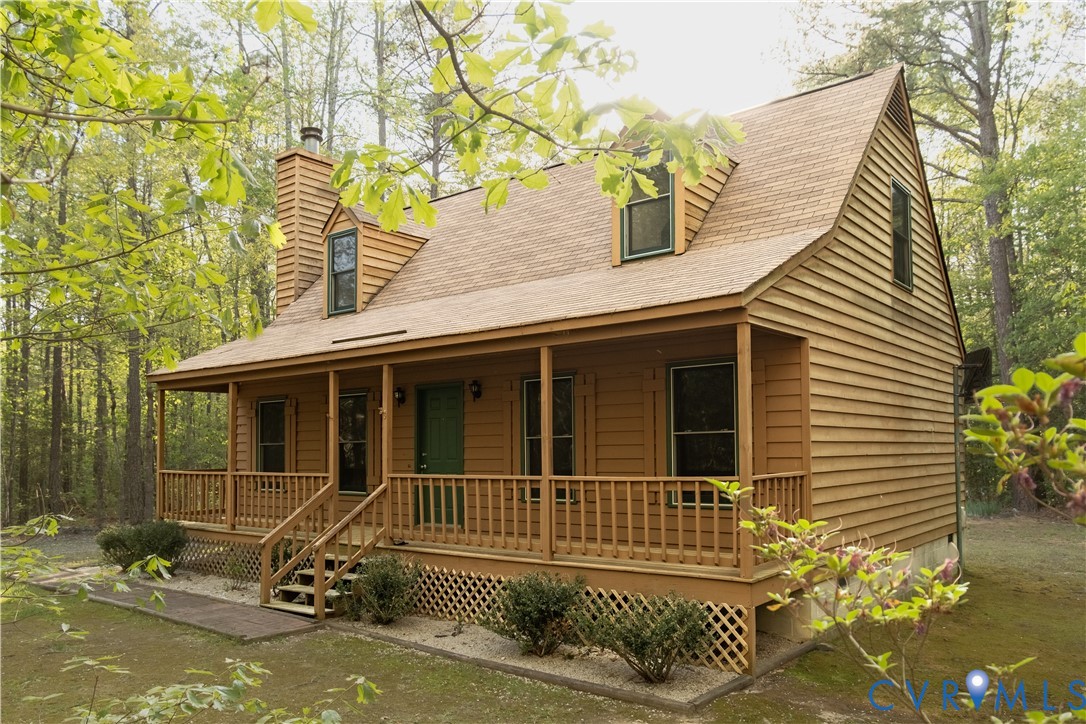 2477 Calno Road Hanover, VA 23069 - Photo 3 of 33 a view of a house with a window and wooden fence