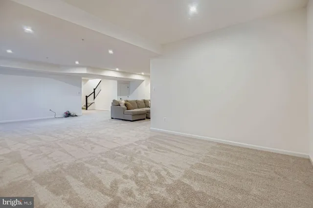 a view of kitchen and a refrigerator