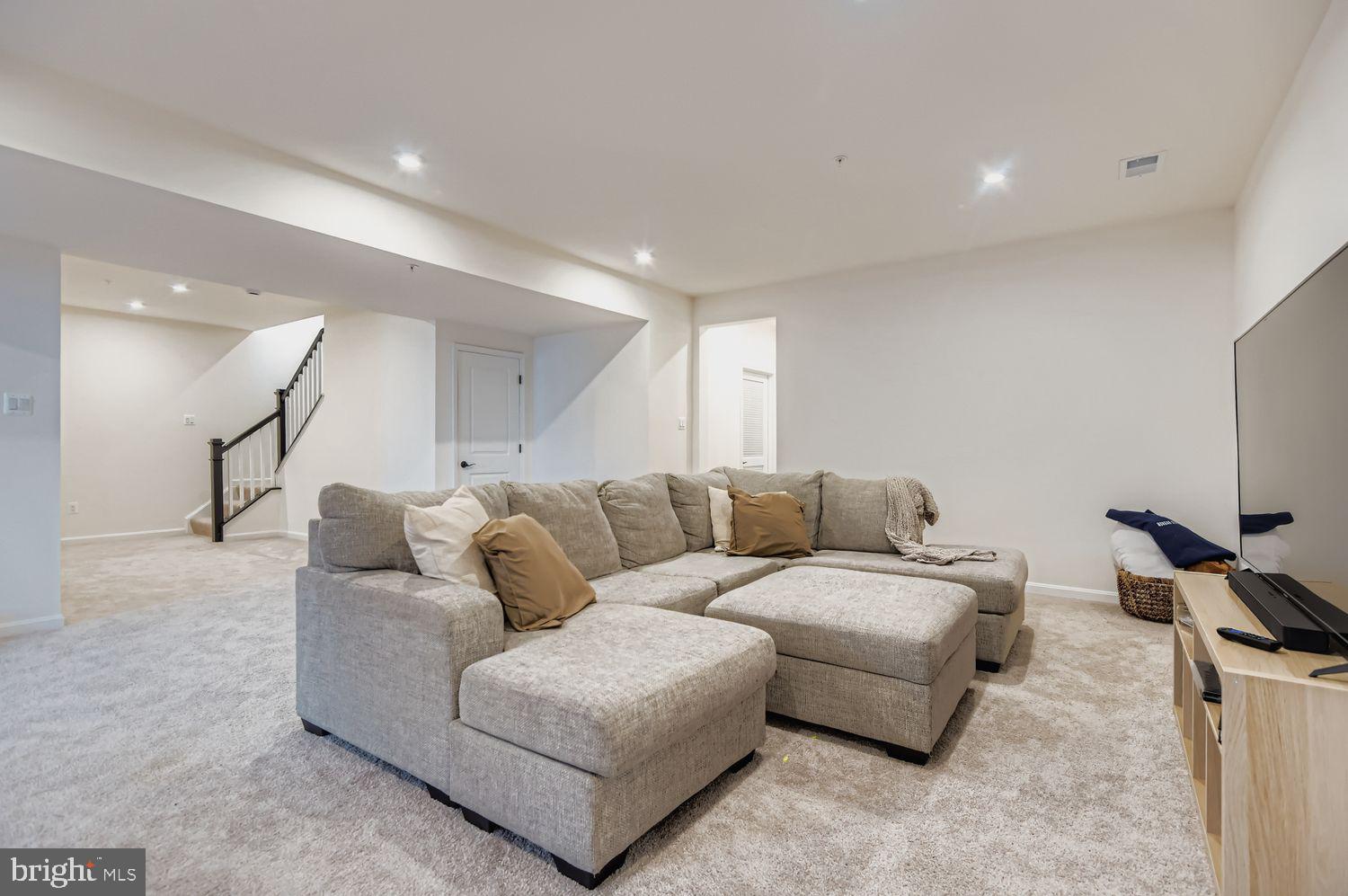 5708 Charlies Way White Marsh, MD 21162 - Photo 32 of 39 a living room with furniture and a couch