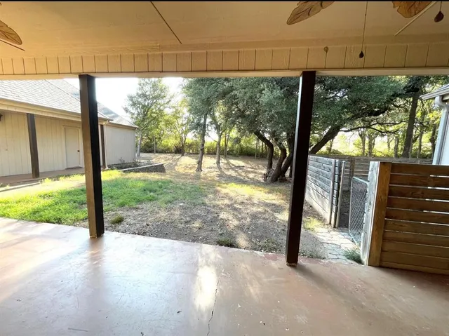 a view of a porch with backyard
