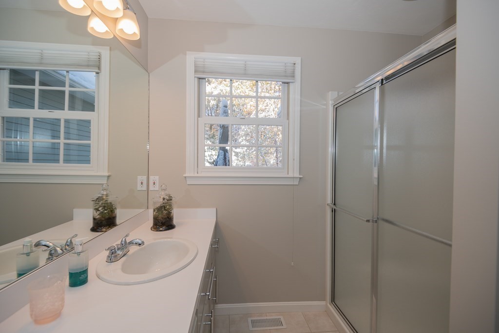 7 Round Table Road Shrewsbury, MA 01545 - Photo 18 of 39 a bathroom with a sink toilet and tub