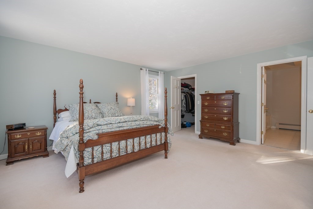 7 Round Table Road Shrewsbury, MA 01545 - Photo 19 of 39 a bedroom with a bed and a cabinets