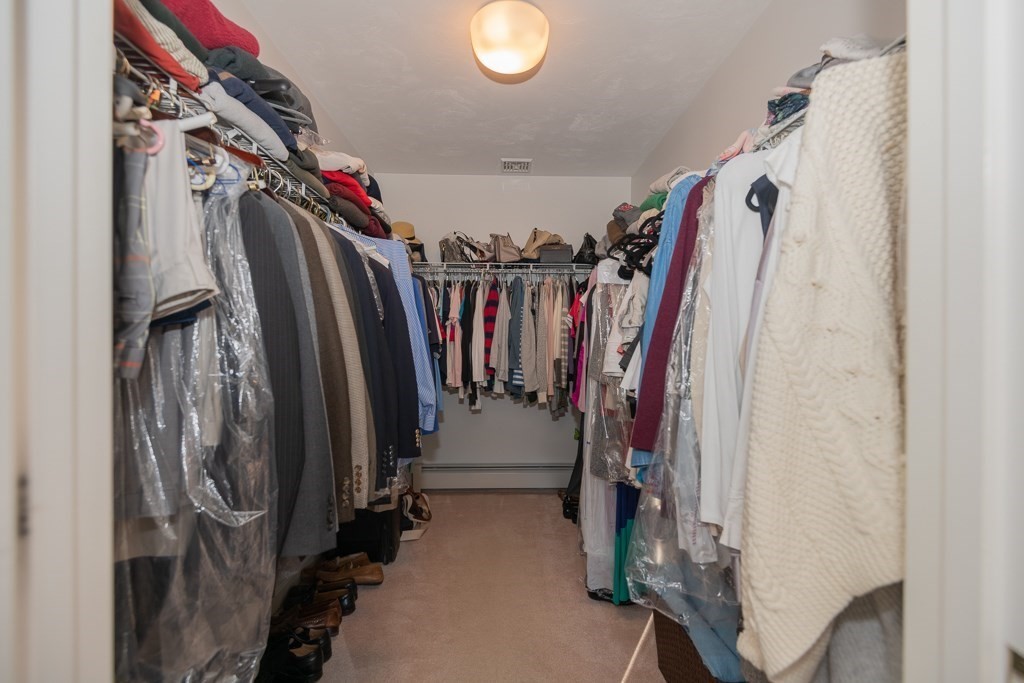 7 Round Table Road Shrewsbury, MA 01545 - Photo 20 of 39 a view of walk in closet with clothes