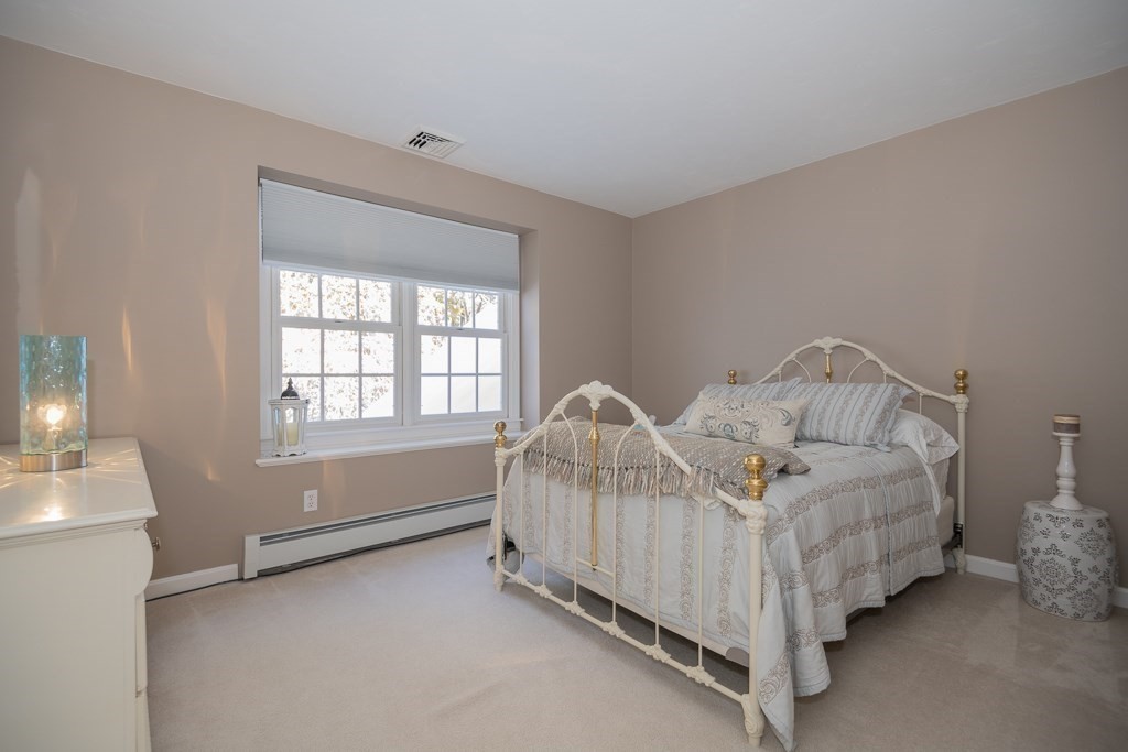 7 Round Table Road Shrewsbury, MA 01545 - Photo 23 of 39 a bedroom with a bed and a window