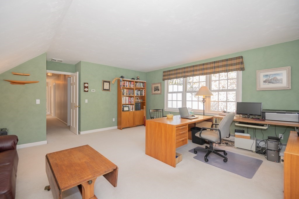 7 Round Table Road Shrewsbury, MA 01545 - Photo 30 of 39 a view of a livingroom with workspace and a couch