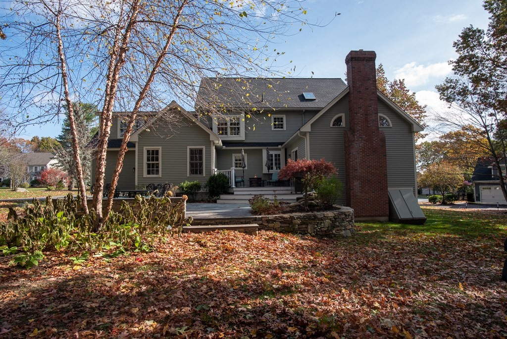 7 Round Table Road Shrewsbury, MA 01545 - Photo 36 of 39 a view of a house with many windows and plants