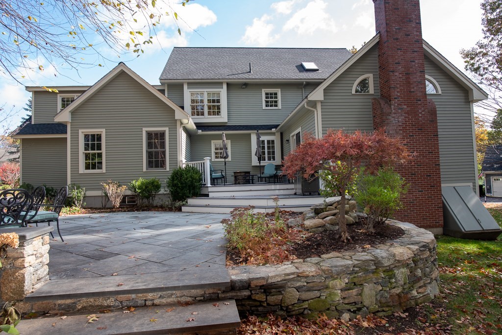 7 Round Table Road Shrewsbury, MA 01545 - Photo 38 of 39 a front view of a house with a yard