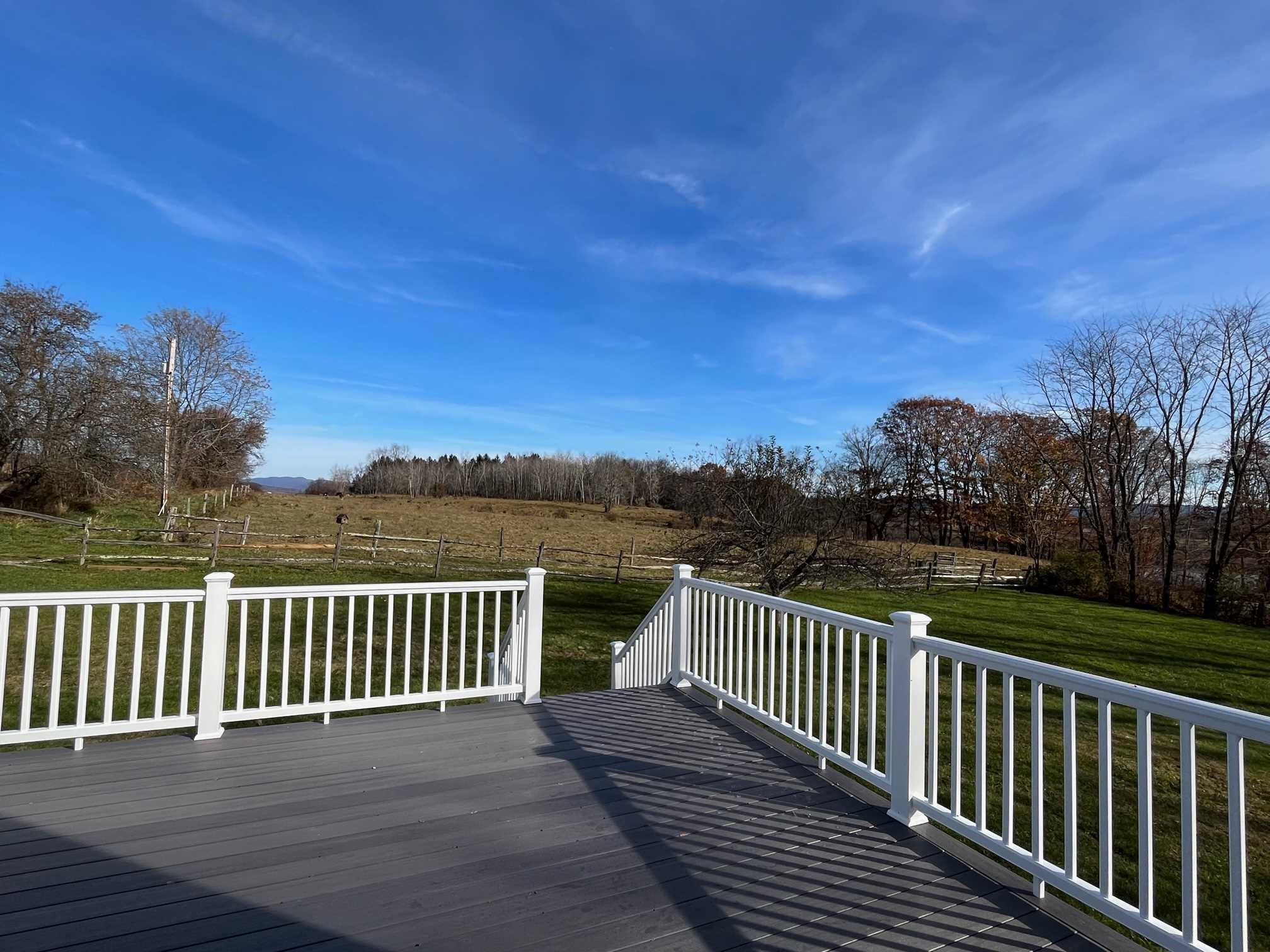 39 Haight Road North East, NY 12501 - Photo 11 of 11 a view of balcony with wooden floor and fence
