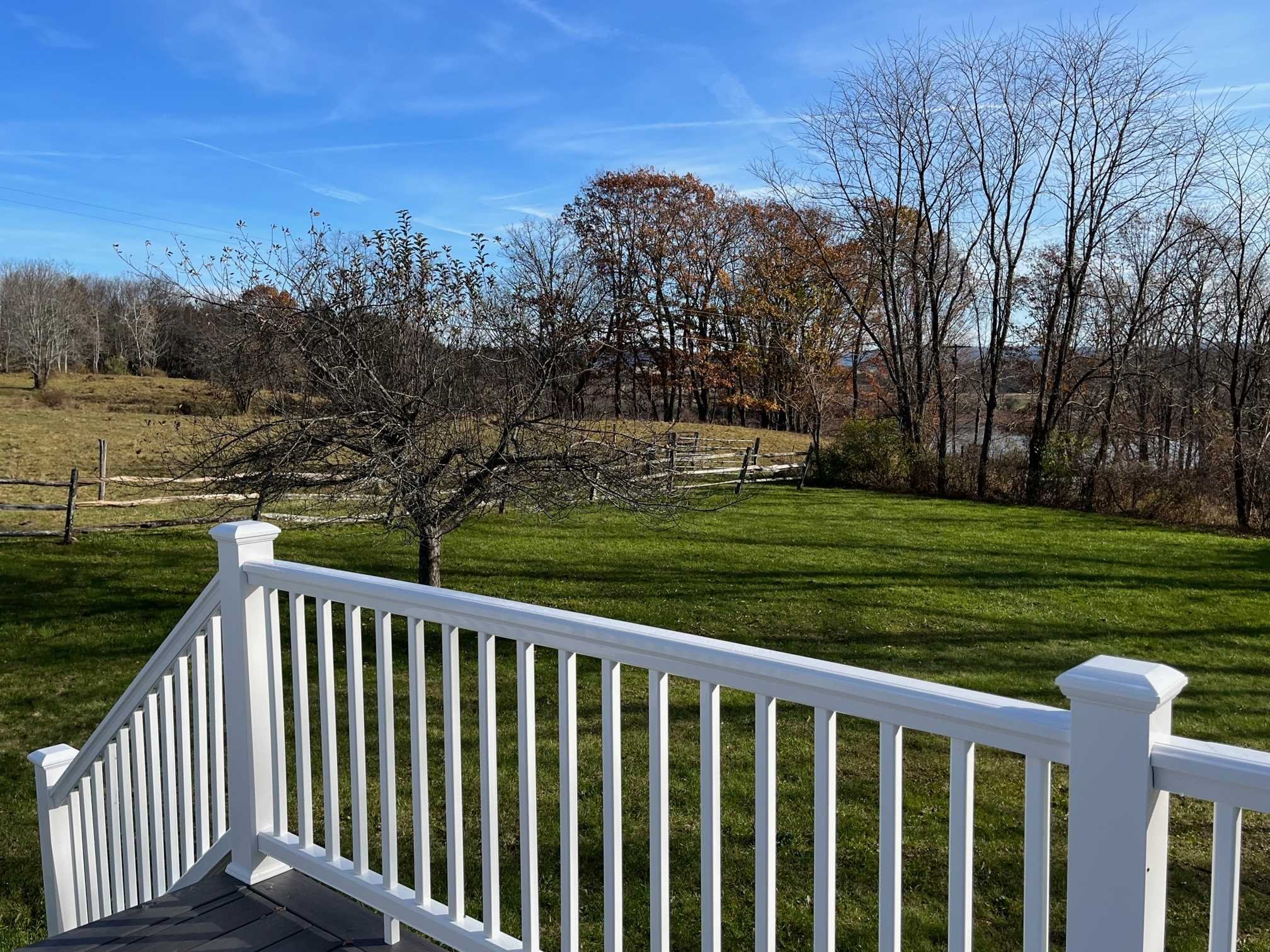 39 Haight Road North East, NY 12501 - Photo 2 of 11 a view of a wooden deck and a yard with swimming pool