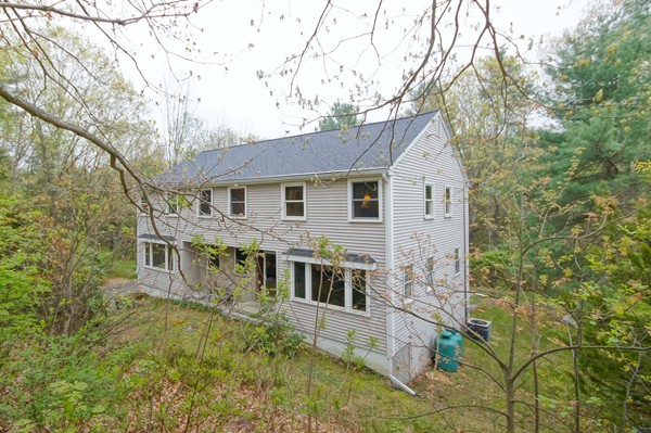 16 Depot Road Boxborough, MA 01719 - Photo 1 of 28 a white house that has a tree in front of it