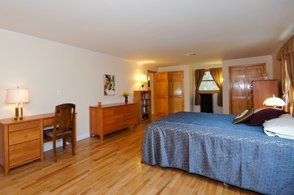 16 Depot Road Boxborough, MA 01719 - Photo 16 of 28 a bedroom with a bed and wooden furniture