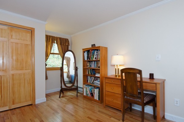 16 Depot Road Boxborough, MA 01719 - Photo 18 of 28 a view of a workspace with furniture and wooden floor