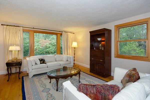 16 Depot Road Boxborough, MA 01719 - Photo 2 of 28 a living room with furniture and a large window