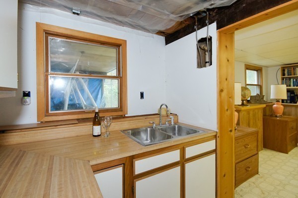 16 Depot Road Boxborough, MA 01719 - Photo 27 of 28 a bathroom with a sink and mirror