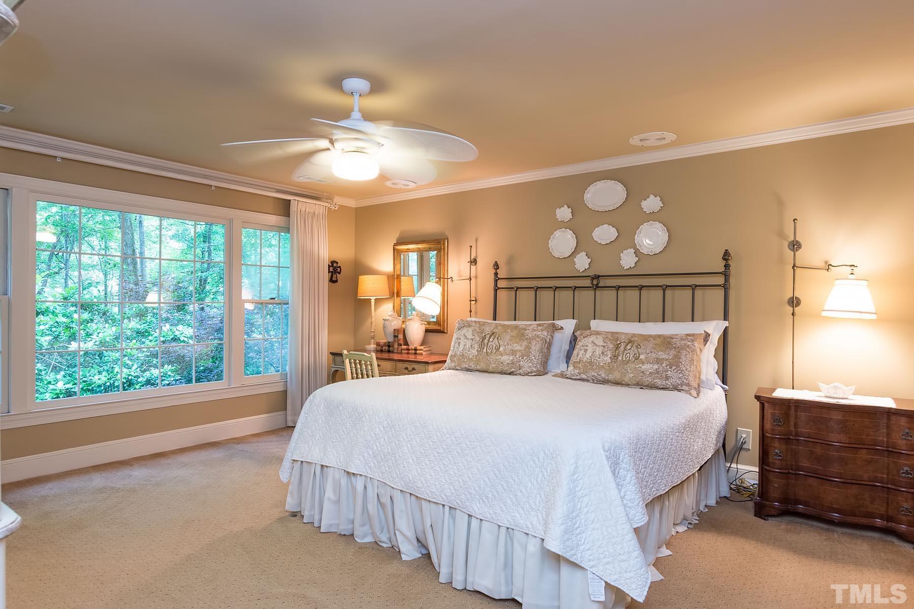 2301 Valley Forge Road Raleigh, NC 27615 - Photo 14 of 21 a bedroom with a large bed and a window