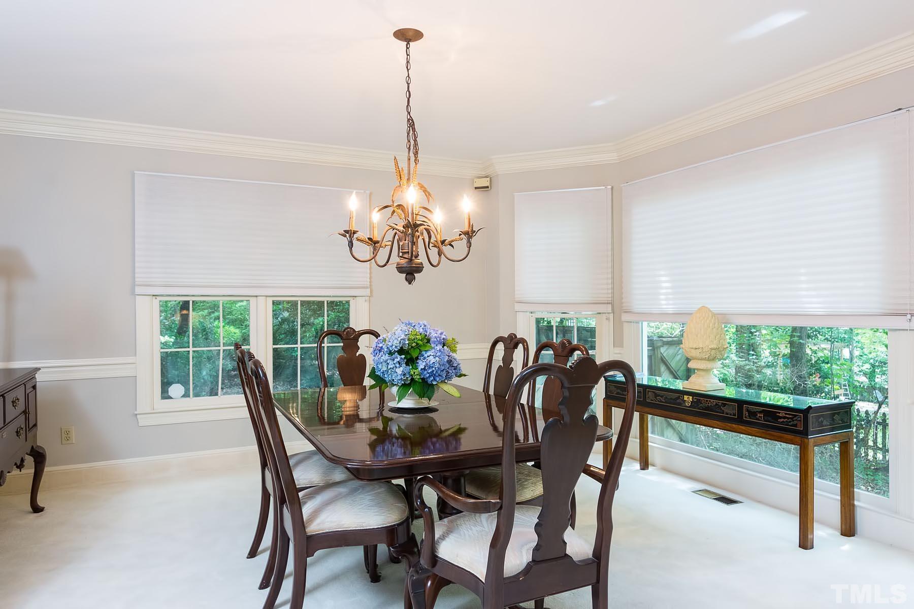 2301 Valley Forge Road Raleigh, NC 27615 - Photo 8 of 21 a view of a dining room with furniture window and outside view