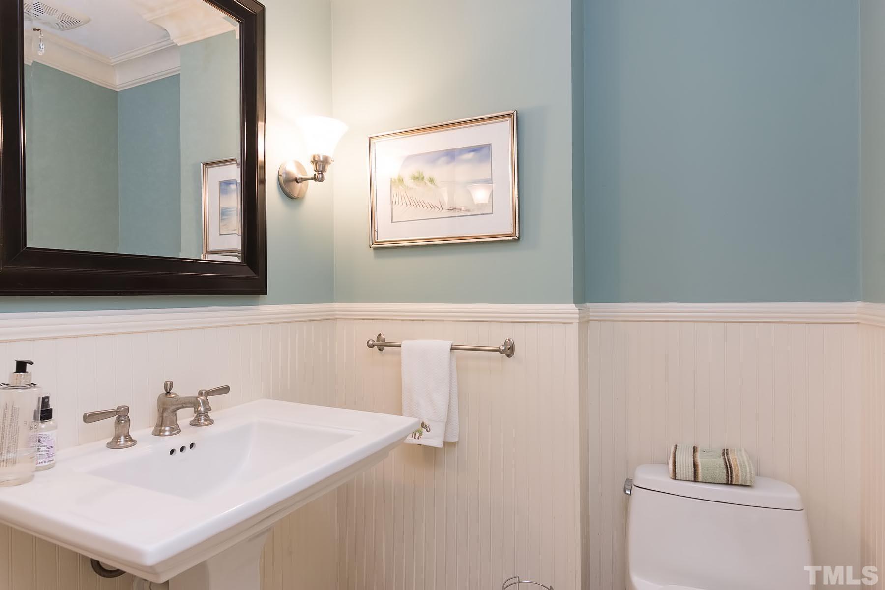2301 Valley Forge Road Raleigh, NC 27615 - Photo 9 of 21 a bathroom with a sink and a mirror