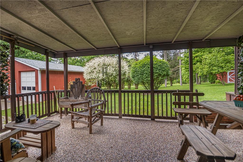 110 Lovi Road Baden, PA 15005 - Photo 23 of 33 a view of a patio with a table chairs and a backyard