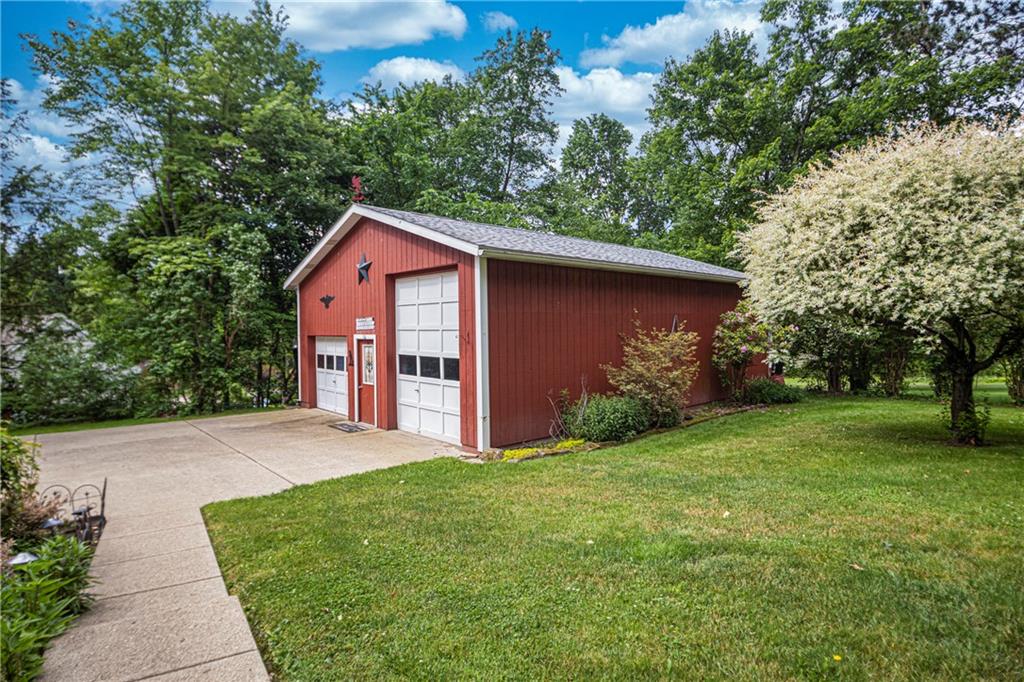 110 Lovi Road Baden, PA 15005 - Photo 24 of 33 a front view of a house with garden