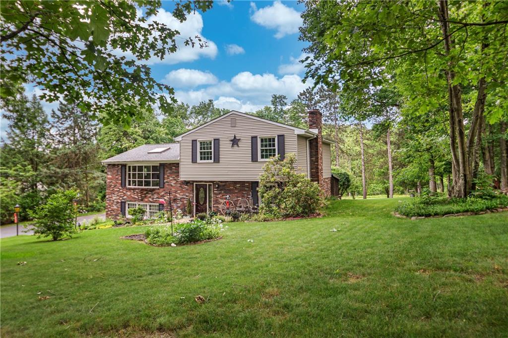 110 Lovi Road Baden, PA 15005 - Photo 25 of 33 a view of a house with yard and a garden
