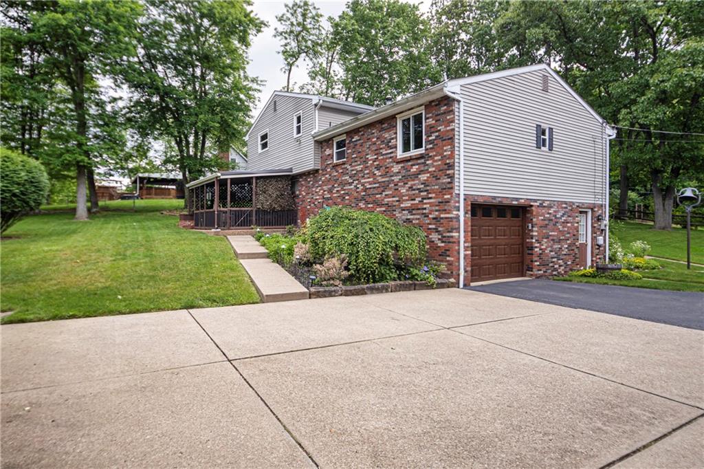 110 Lovi Road Baden, PA 15005 - Photo 28 of 33 a front view of house with yard and green space