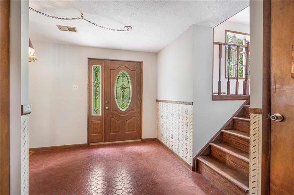 110 Lovi Road Baden, PA 15005 - Photo 4 of 33 a view of an entryway with stairs