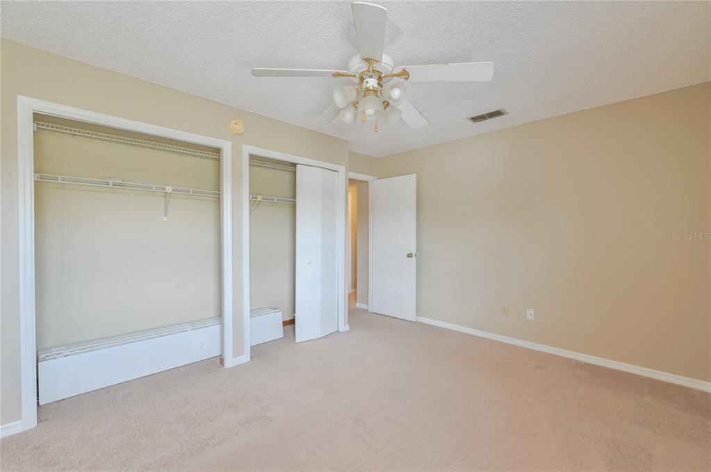 11001 Southeast Sunset Harbor Road, Unit H52 Summerfield, FL 34491 - Photo 11 of 31 a view of an empty room with a window