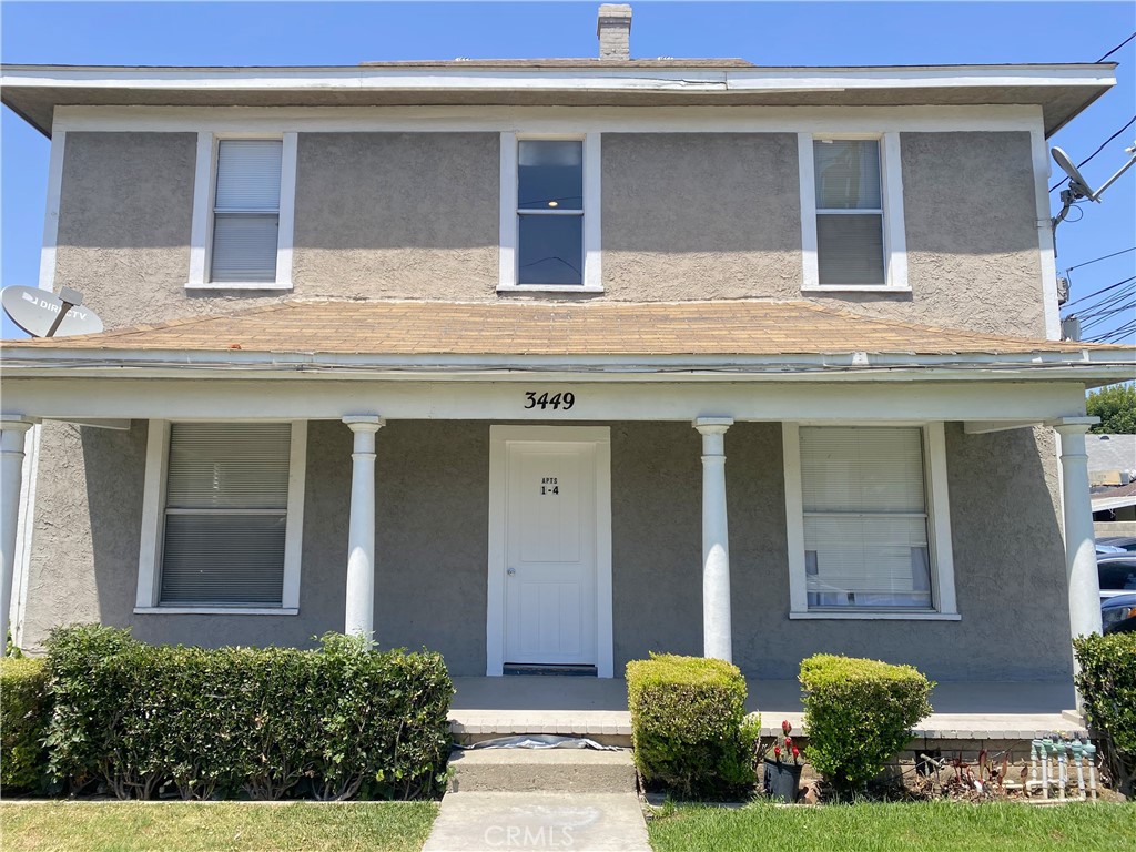 3449 4th Street, Unit 4 Riverside, CA 92501 - Photo 2 of 15 a front view of a house with an outdoor space