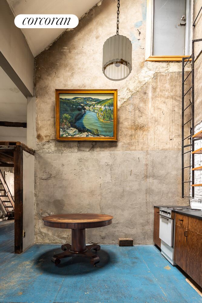 7 Bleecker Street Manhattan, NY 10012 - Photo 10 of 15 a room with pool table and a flat screen tv