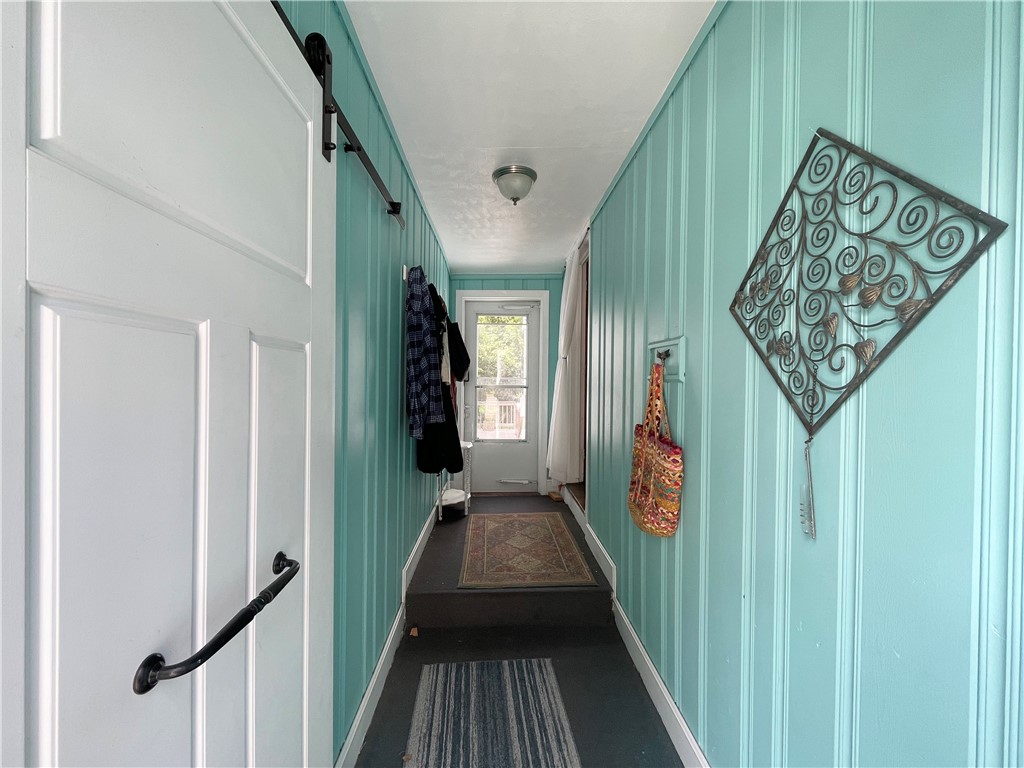 16 Overhill Road Warren, RI 02885 - Photo 15 of 49 A nice side entrance with mudroom storage, access to garage, deck and screened in porch.