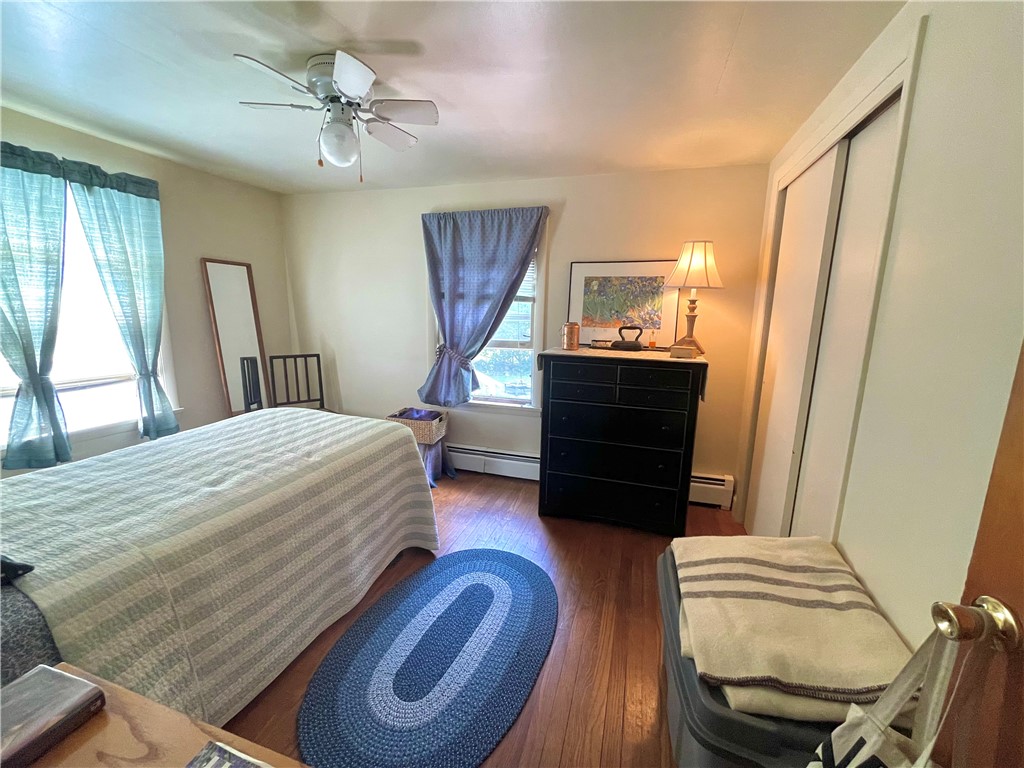 16 Overhill Road Warren, RI 02885 - Photo 30 of 49 The first of three bedrooms all with hardwood flooring.