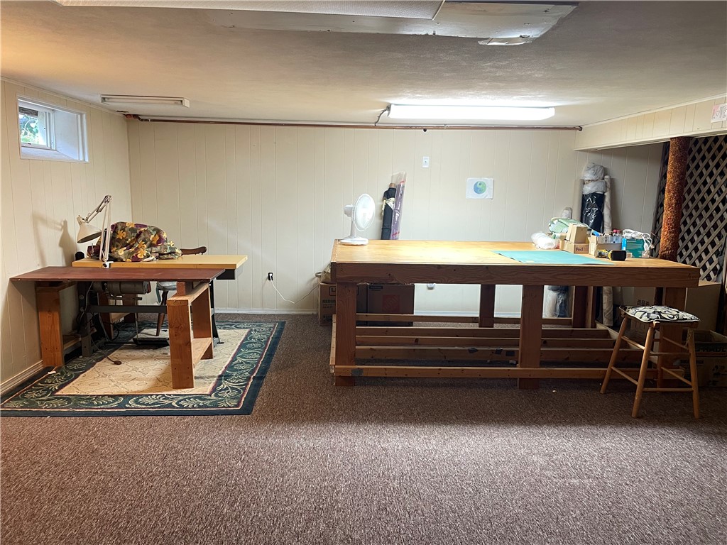 16 Overhill Road Warren, RI 02885 - Photo 42 of 49 The partially finished lower level has great spec for crafting, family room etc.