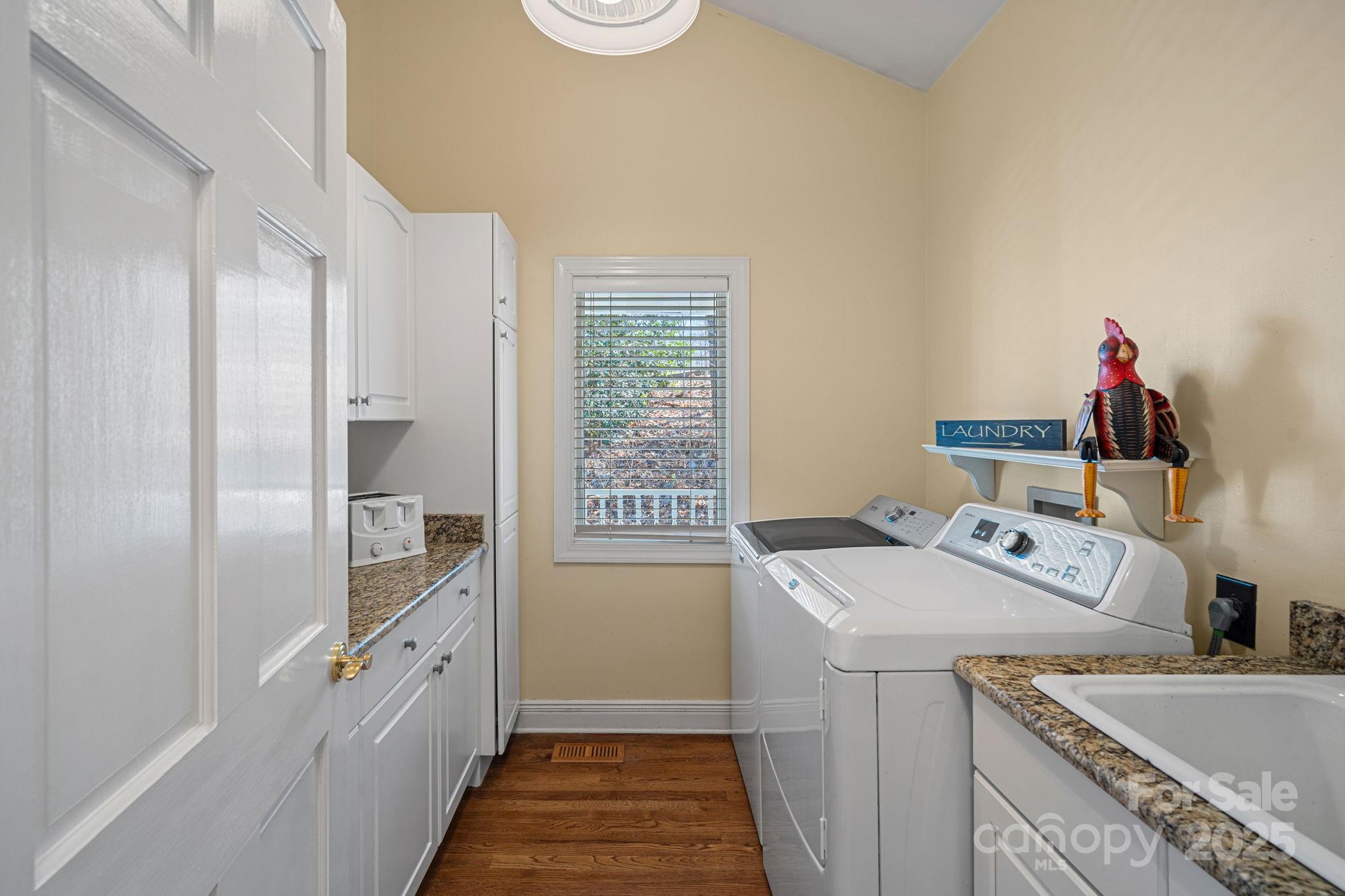 213 Patternote Road Mooresville, NC 28117 - Photo 15 of 48 a storage room with a sink washer and dryer