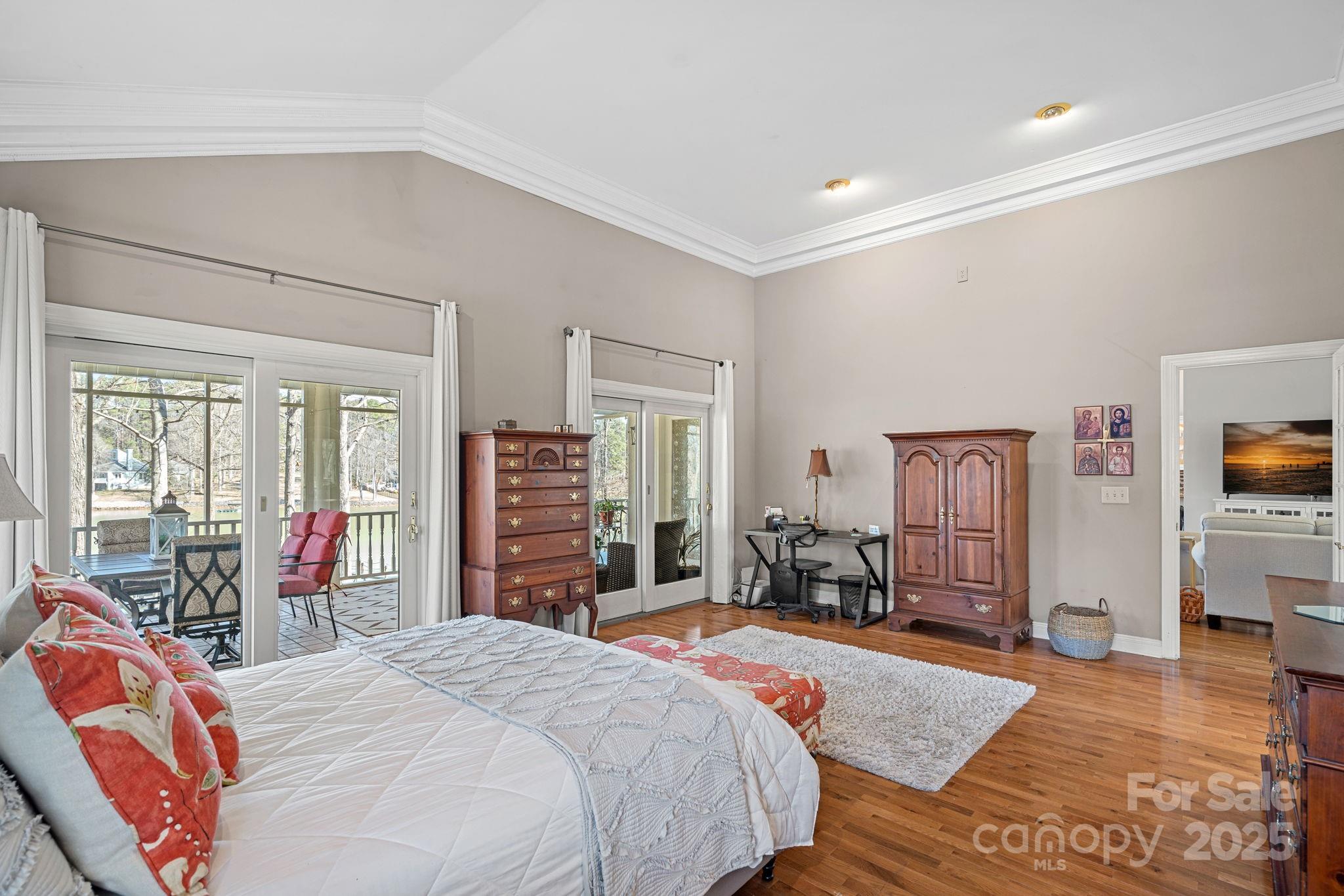 213 Patternote Road Mooresville, NC 28117 - Photo 24 of 48 a bed room with a bed window and a television