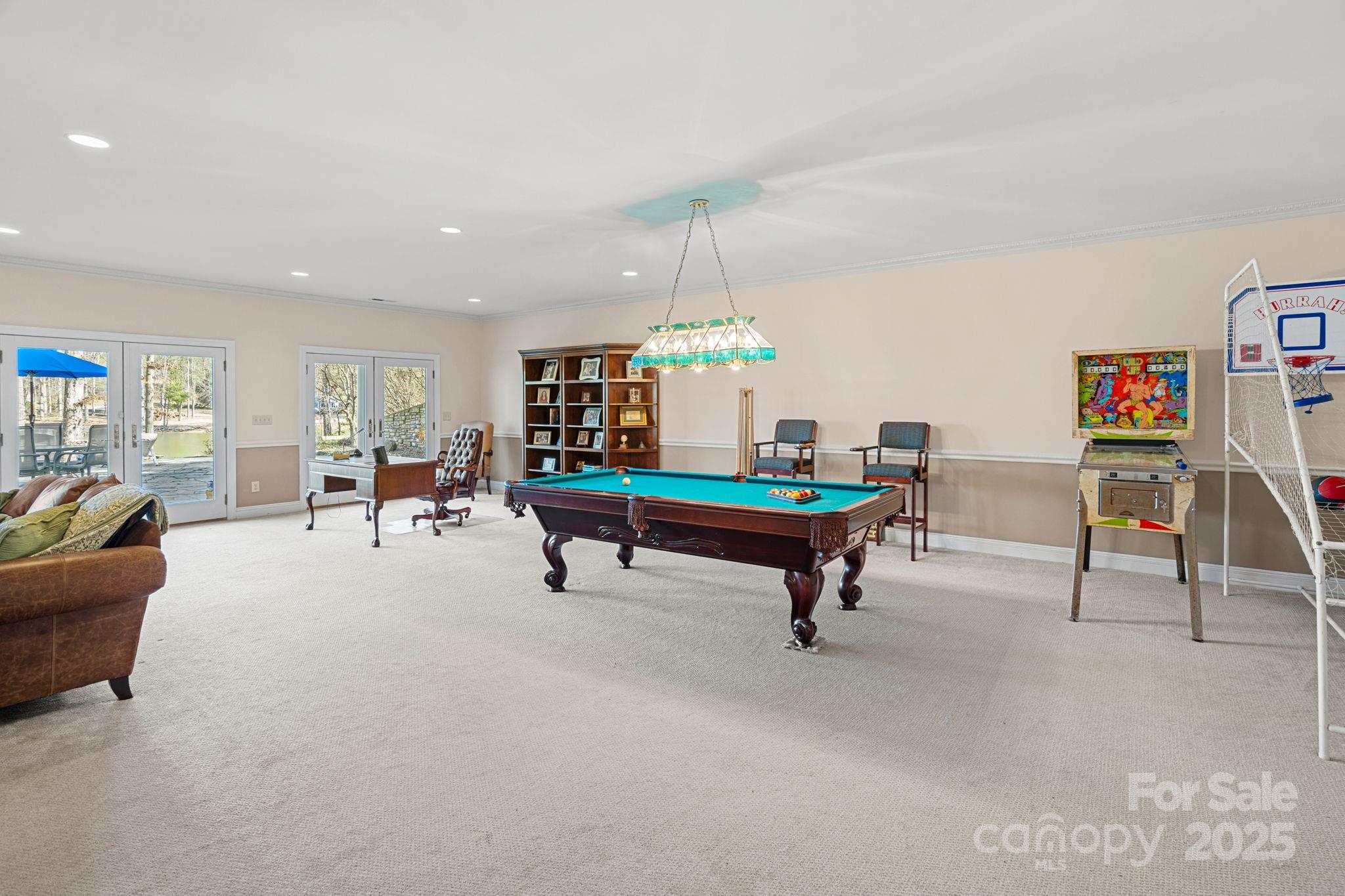 213 Patternote Road Mooresville, NC 28117 - Photo 29 of 48 a living room with furniture and a table