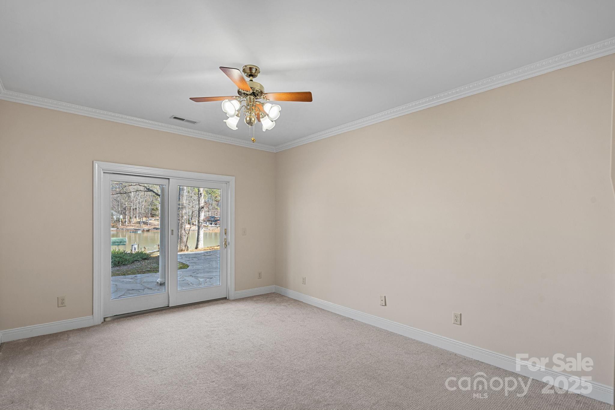 213 Patternote Road Mooresville, NC 28117 - Photo 34 of 48 a view of an empty room with a window