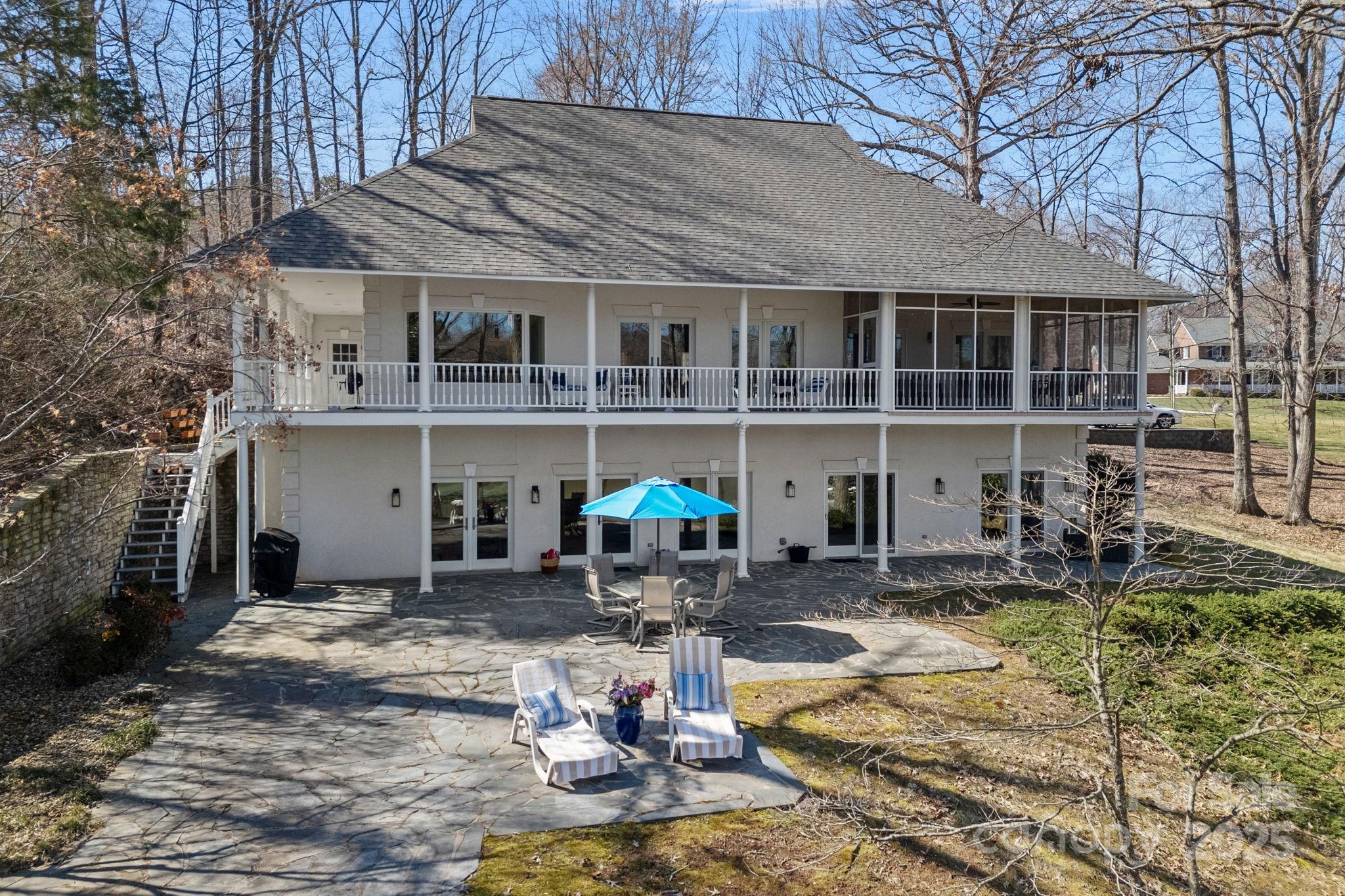 213 Patternote Road Mooresville, NC 28117 - Photo 37 of 48 a front view of a house with swimming pool and sitting area