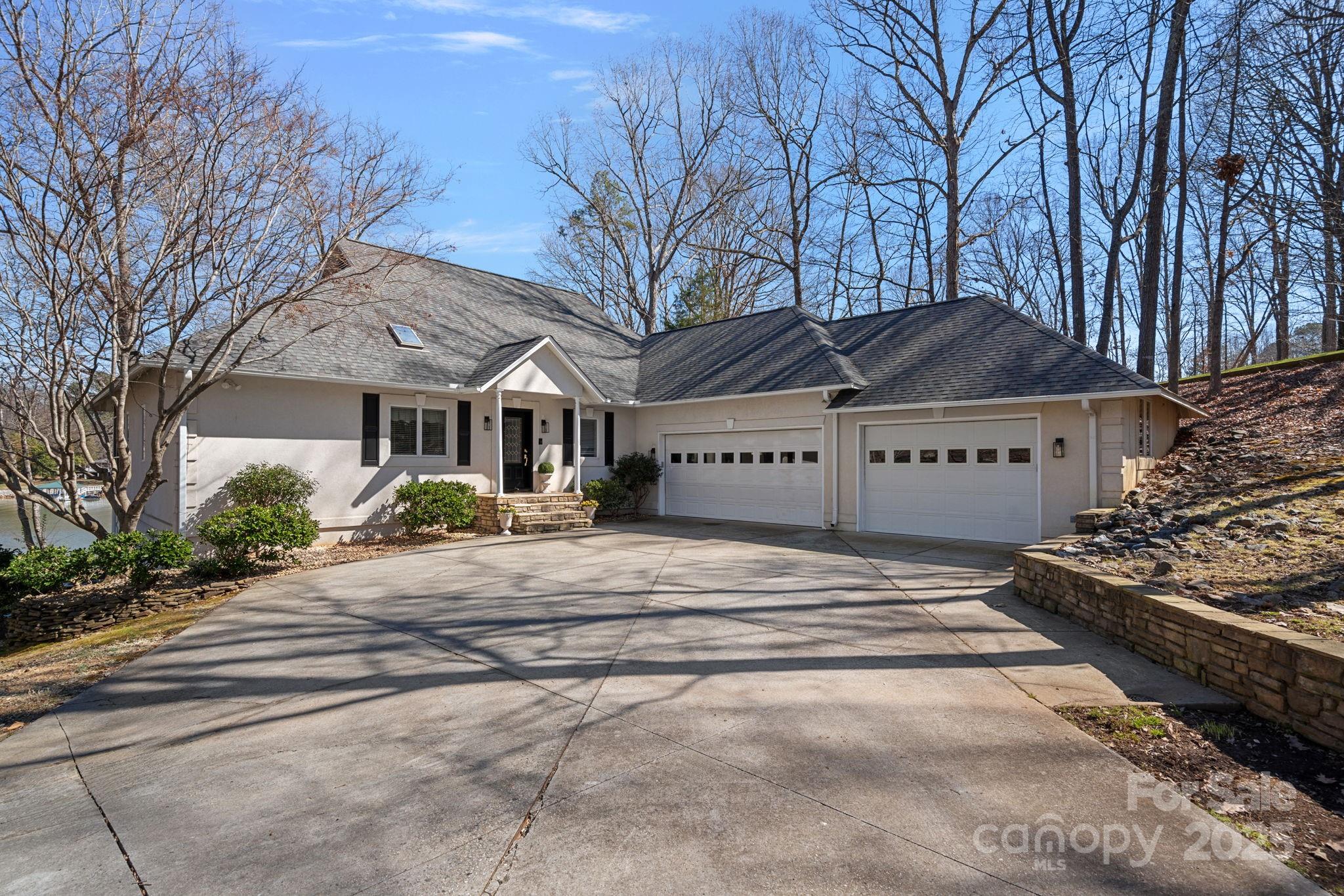 213 Patternote Road Mooresville, NC 28117 - Photo 4 of 48 a front view of a house with a yard and a garage
