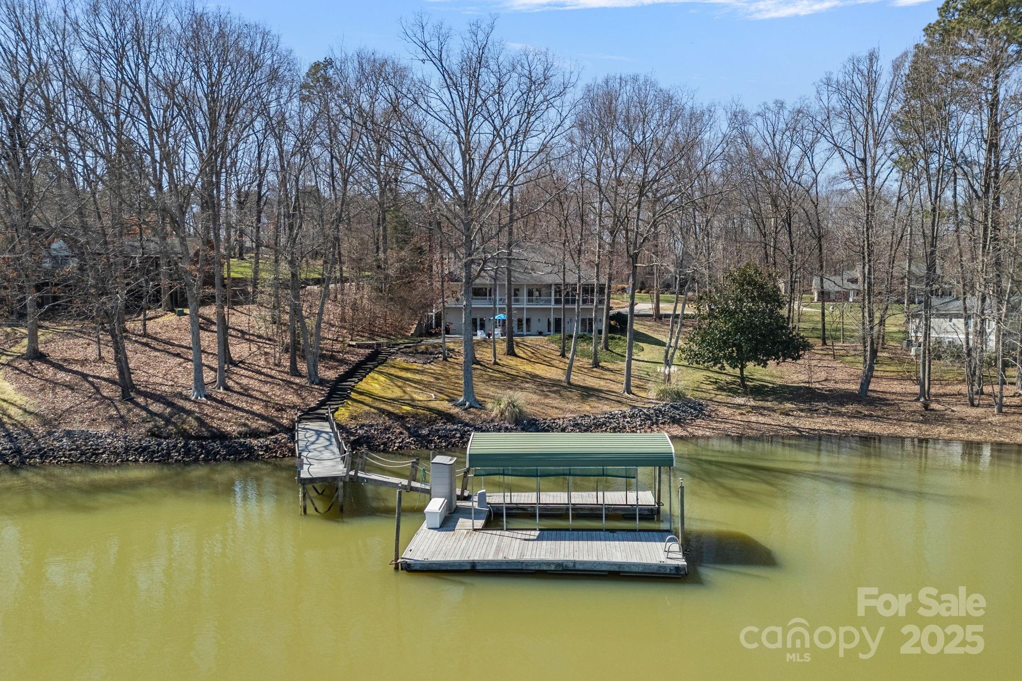 213 Patternote Road Mooresville, NC 28117 - Photo 43 of 48 a small pool with lawn chairs