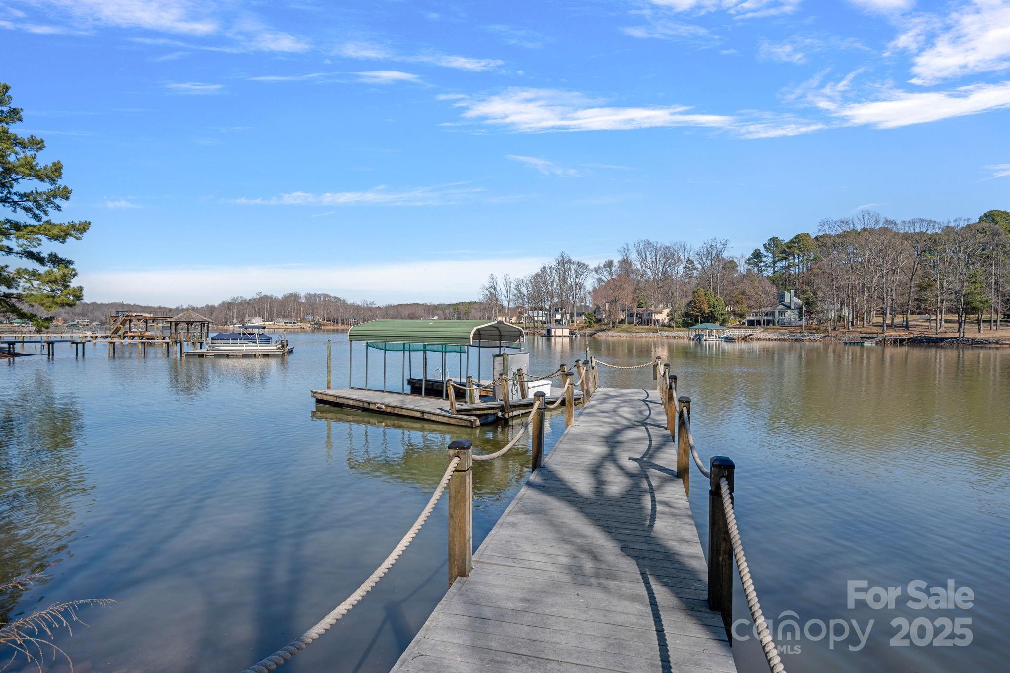 213 Patternote Road Mooresville, NC 28117 - Photo 5 of 48 a view of a lake with houses