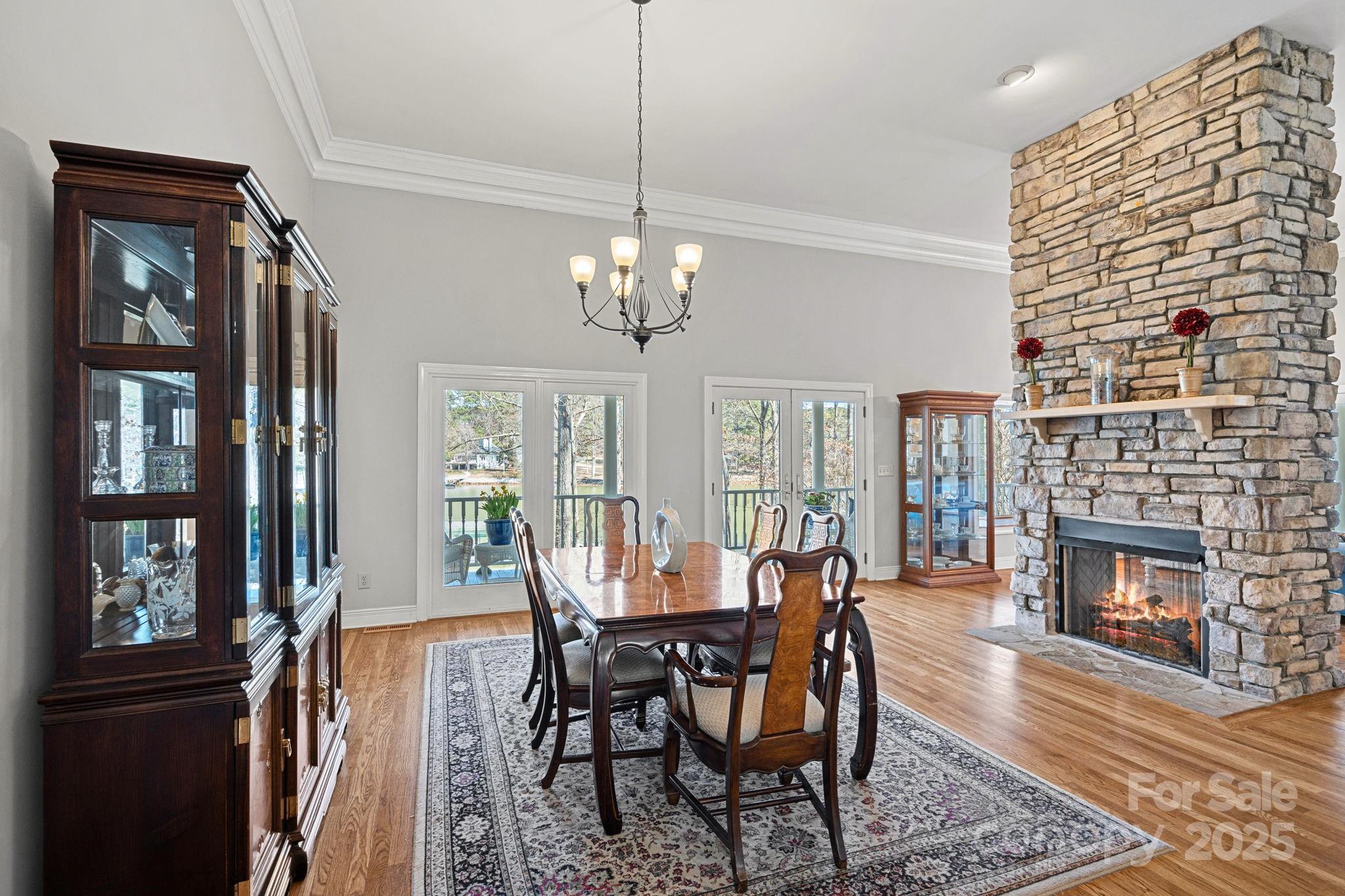 213 Patternote Road Mooresville, NC 28117 - Photo 8 of 48 a view of a dining room with furniture window and wooden floor