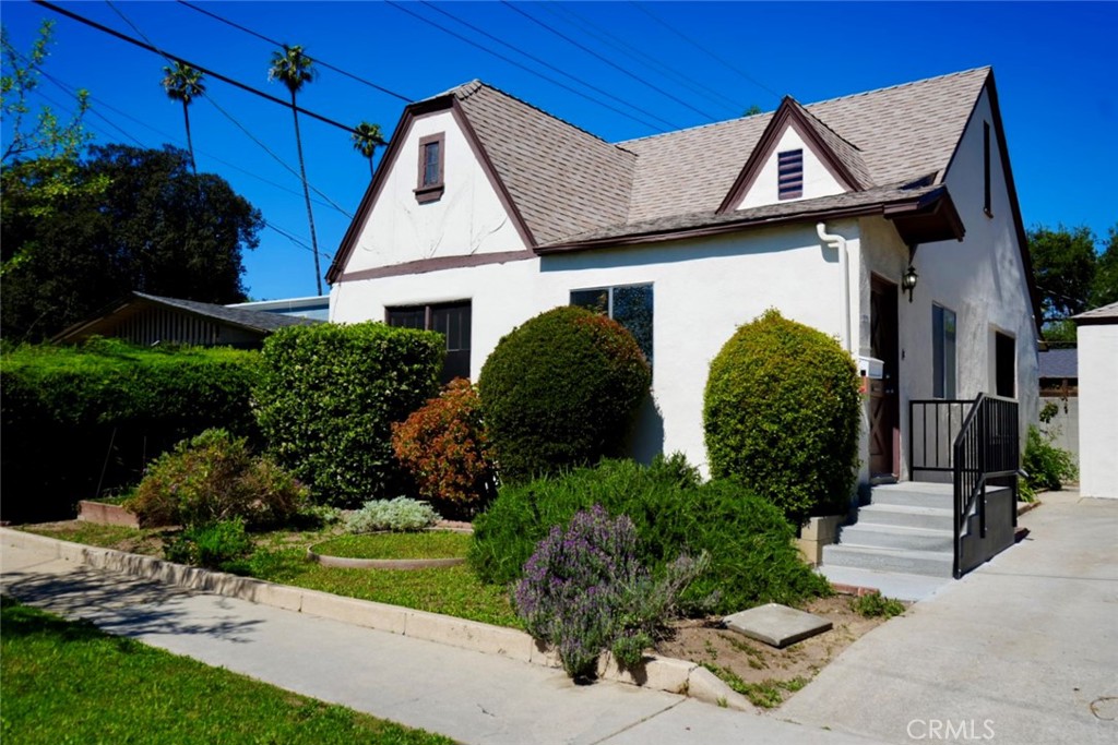 2117 Verde Street Pasadena, CA 91107 - Photo 2 of 13 a front view of a house with garden