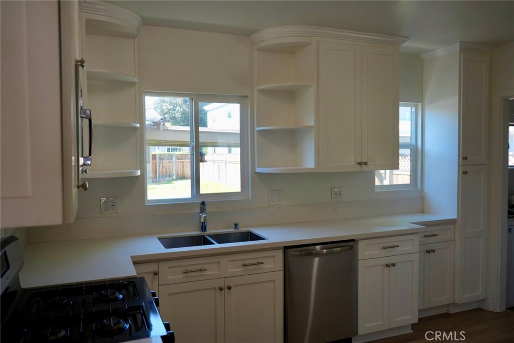 2117 Verde Street Pasadena, CA 91107 - Photo 6 of 13 a kitchen with sink and cabinets