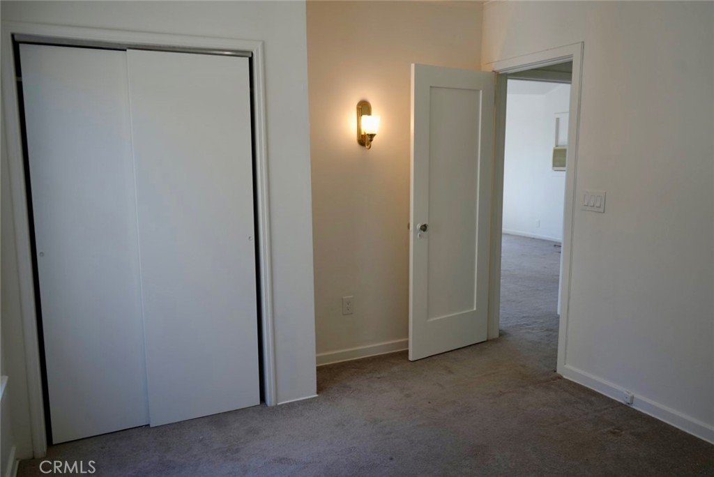2117 Verde Street Pasadena, CA 91107 - Photo 8 of 13 a view of an empty room with closet and mirror