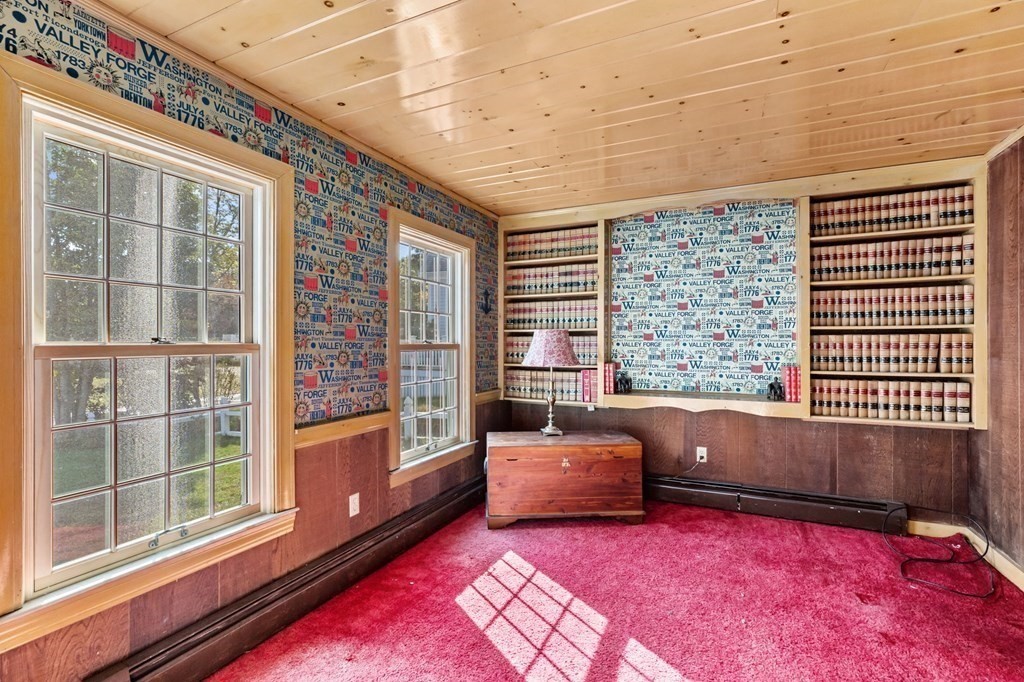 7 Zora Road Marion, MA 02738 - Photo 11 of 38 a living room with furniture and a rug