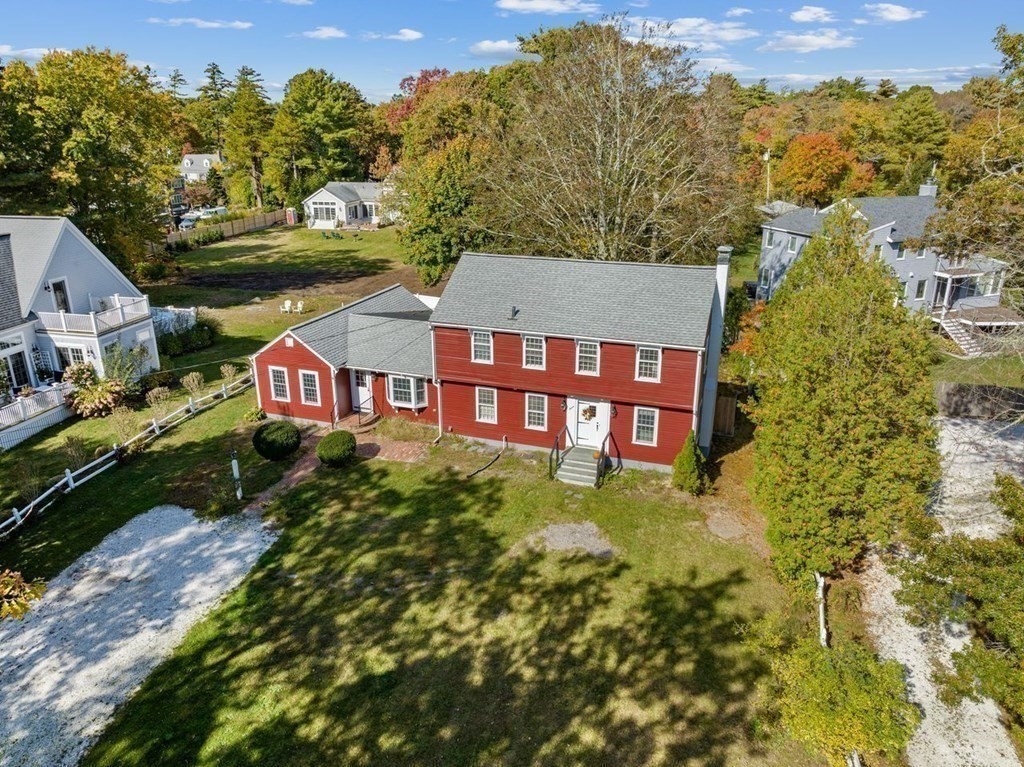 7 Zora Road Marion, MA 02738 - Photo 26 of 38 a view of a house with a big yard and large trees