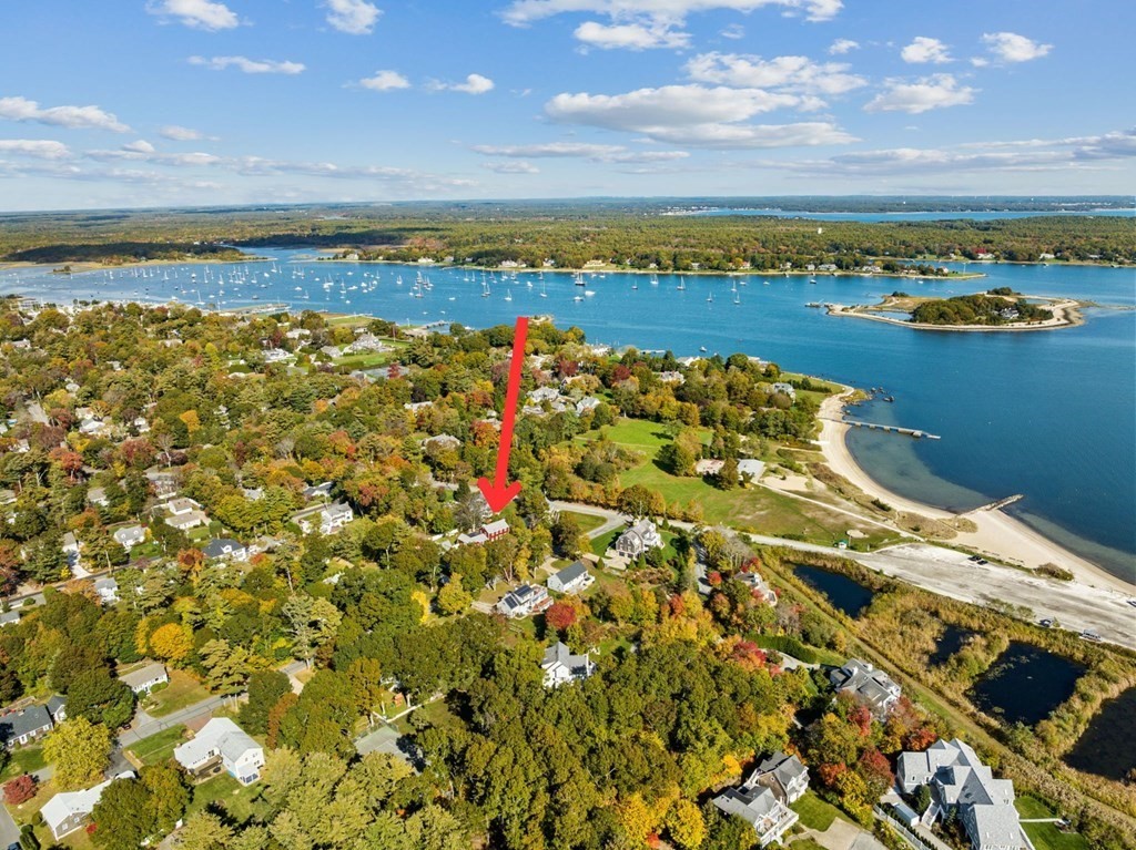 7 Zora Road Marion, MA 02738 - Photo 3 of 38 a view of a city with an ocean