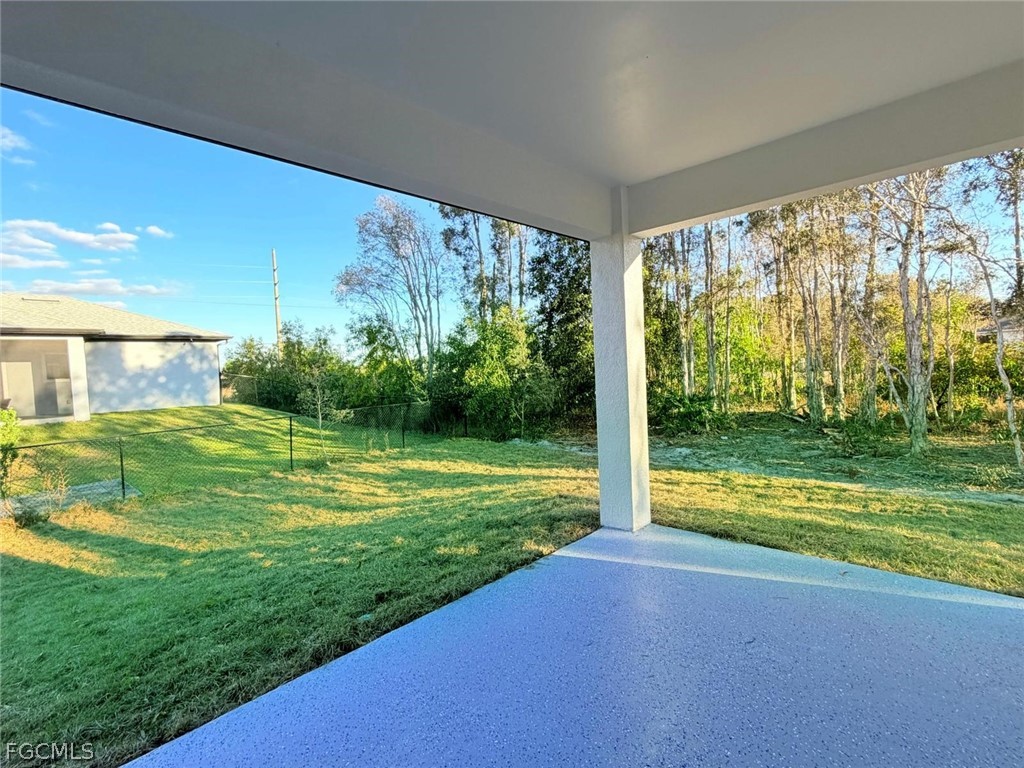 767 Crystal Avenue Lehigh Acres, FL 33974 - Photo 14 of 17 a view of a room with garden view