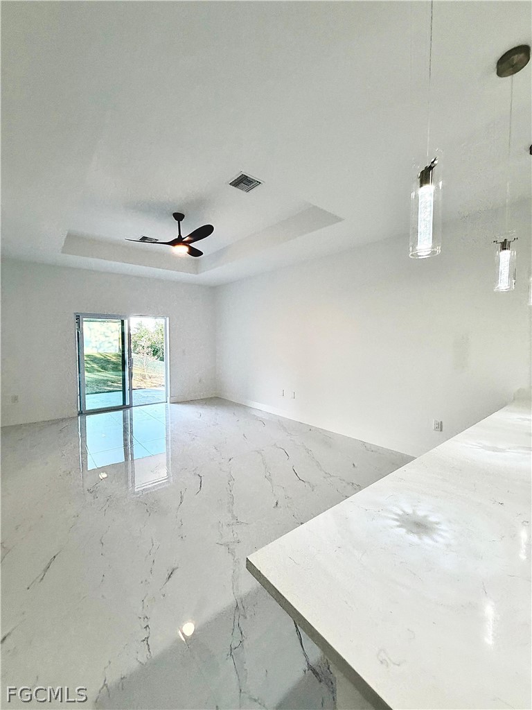 767 Crystal Avenue Lehigh Acres, FL 33974 - Photo 7 of 17 a view of an empty room and window